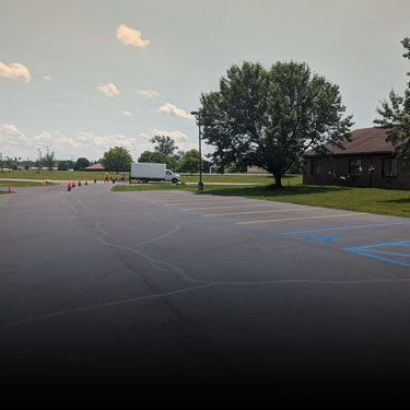Pothole and crack repair on an asphalt surface
